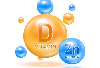Minerals zinc Zn and Vitamin D capsule solution serum colorful balls. On white background. Healthy food supplement. 3D Realistic Vector EPS10.